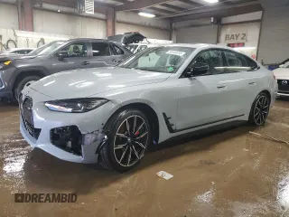 2023 BMW i4 M50 z VIN WBY33AW00PFP81013, wystawiony jako Copart lot #50048355 z przebiegiem 24 076 mil mil oraz Szkody całkowita. Historia ofert i sprzedaży dostępna na DreamBid. Obrazek 1.