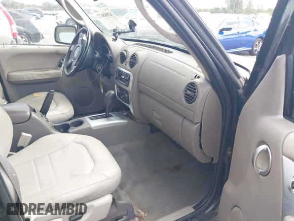 2003 Jeep Liberty Limited with VIN 1J4GK58K13W719457, listed as a IAAI auction lot 42088672 with 179,214 mi miles and . Bid and sale history available at carsss.com. Image 5.
