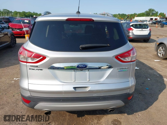 2015 Ford Escape Titanium z VIN 1FMCU0J90FUC02039, wystawiony jako IAAI lot #42369882 z przebiegiem 156 287 mil mil oraz . Historia ofert i sprzedaży dostępna na DreamBid. Obrazek 15.