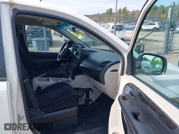 2012 Dodge Grand Caravan SXT with VIN 2C4RDGCGXCR358794, listed as a IAAI auction lot 42007316 with 212,518 mi miles and . Bid and sale history available at DreamBid. Image 5.