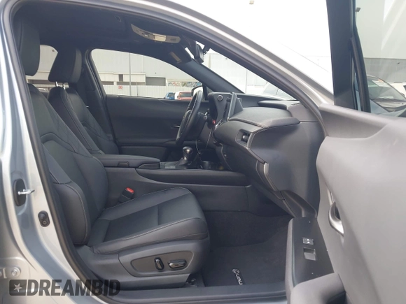 2023 Lexus UX 250h Premium z VIN JTHP6JBH5P2145912, wystawiony jako IAAI lot #42401353 z przebiegiem 14 252 mil mil oraz . Historia ofert i sprzedaży dostępna na DreamBid. Obrazek 5.