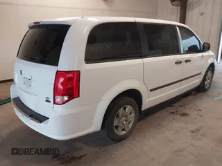 2014 Ram Cargo Van Tradesman with VIN 2C4JRGAG9ER186052, listed as a IAAI auction lot 41879655 with 239,442 mi miles. Bid and sale history available at carsss.com. Image 4.