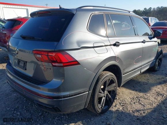 2023 Volkswagen Tiguan SE R-Line Black with VIN 3VV8B7AX3PM014632, listed as a IAAI auction lot 41002858 with 40,955 mi miles. Bid and sale history available at carsss.com. Image 4.