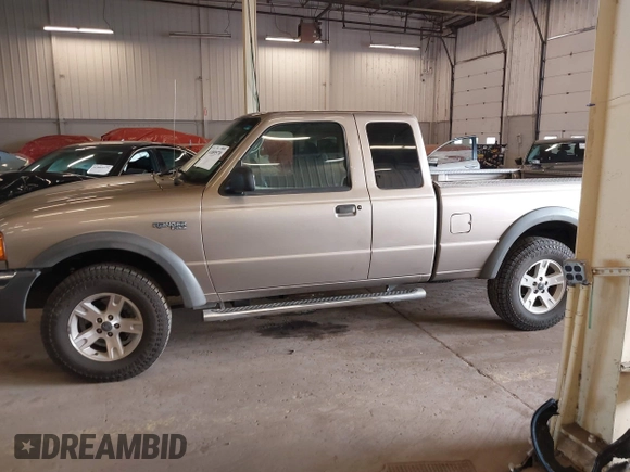 2003 Ford Ranger XL Fleet with VIN 1FTZR45E93PB01008, listed as a IAAI auction lot 41889570 with 197,493 mi miles and . Bid and sale history available at carsss.com. Image 14.