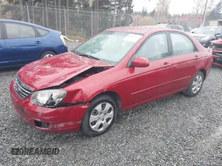 2009 Kia Spectra EX with VIN KNAFE222695621925, listed as a IAAI auction lot 40657622 with 135,647 mi miles. Bid and sale history available at carsss.com. Image 17.