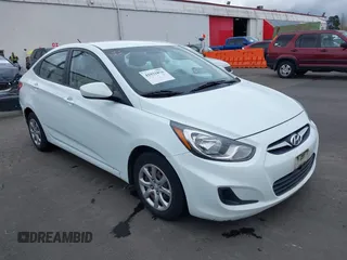 2013 Hyundai Accent GLS with VIN KMHCT4AE6DU291877, listed as a IAAI auction lot 41931876 with 136,781 mi miles. Bid and sale history available at carsss.com. Image 1.