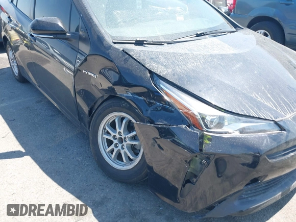 2019 Toyota Prius L Eco with VIN JTDKARFU0K3087064, listed as a IAAI auction lot 41986365 with 81,735 mi miles. Bid and sale history available at carsss.com. Image 6.