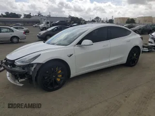 2019 Tesla Model 3 Mid Range with VIN 5YJ3E1EA8KF412886, listed as a Copart auction lot 50824565 with 54,803 mi miles and Salvage Title. Bid and sale history available at carsss.com. Image 1.