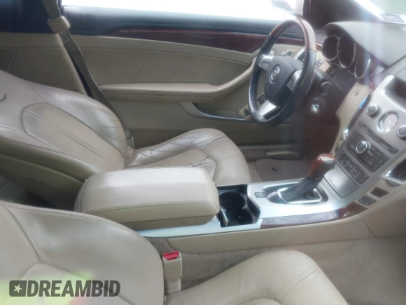 2013 Cadillac CTS Coupe Premium with VIN 1G6DS1E36D0107566, listed as a IAAI auction lot 42079197 with 122,386 mi miles. Bid and sale history available at carsss.com. Image 5.