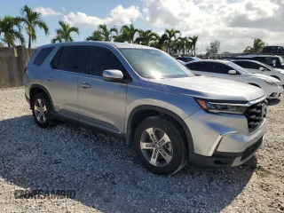 2024 Honda Pilot EX-L 7 Passenger with VIN 5FNYG2H50RB007894, listed as a Copart auction lot 59764574 with 3,801 mi miles and Non Repairable. Bid and sale history available at carsss.com. Image 4.