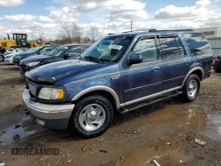 1999 Ford Expedition XLT z VIN 1FMPU18L5XLB51556, wystawiony jako Copart lot #49698855 z przebiegiem 194 898 mil mil oraz Szkoda całkowita • Salvage title. Historia ofert i sprzedaży dostępna na DreamBid. Obrazek 1.