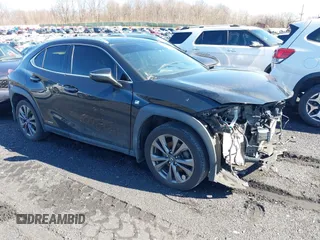2021 Lexus UX with VIN JTHR9JBH9M2054413, listed as a IAAI auction lot 41437199 with 121,555 mi miles. Bid and sale history available at carsss.com. Image 1.