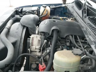 2002 Chevrolet Silverado 1500HD LS z VIN 1GCGK13U92F161881, wystawiony jako IAAI lot #41542660 z przebiegiem 267 478 mil mil oraz . Historia ofert i sprzedaży dostępna na DreamBid. Obrazek 14.