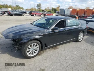 2018 BMW 7 Series 740i xDrive with VIN WBA7E4C54JGV23901, listed as a Copart auction lot 77322824 with 70,922 mi miles and Salvage Title. Bid and sale history available at carsss.com. Image 1.