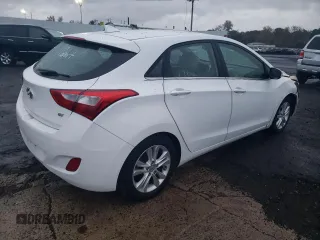 2013 Hyundai Elantra GT with VIN KMHD35LE3DU037700, listed as a Copart auction lot 73755414 with 142,974 mi miles and Salvage Title. Bid and sale history available at carsss.com. Image 3.