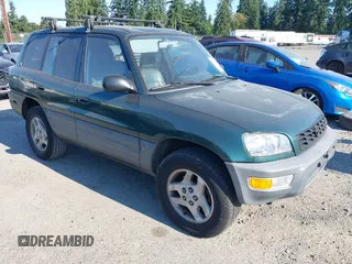 1998 Toyota RAV4 z VIN JT3GP10V0W0021729, wystawiony jako IAAI lot #42685961 z przebiegiem 200 268 mil mil oraz . Historia ofert i sprzedaży dostępna na DreamBid. Obrazek 1.