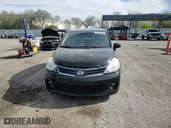 2011 Nissan Versa SL z VIN 3N1BC1CP3BL380457, wystawiony jako Copart lot #53402025 z przebiegiem 94 714 mil mil oraz Szkoda całkowita • Salvage title. Historia ofert i sprzedaży dostępna na DreamBid. Obrazek 11.
