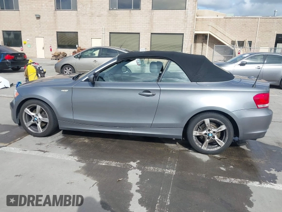 2012 BMW 1 Series 128i with VIN WBAUN1C52CVR00421, listed as a IAAI auction lot 41594256 with 107,957 mi miles and . Bid and sale history available at DreamBid. Image 14.