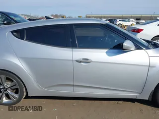 2012 Hyundai Veloster w/Black Int with VIN KMHTC6AD7CU063968, listed as a IAAI auction lot 41764263 with 83,634 mi miles and . Bid and sale history available at DreamBid. Image 13.