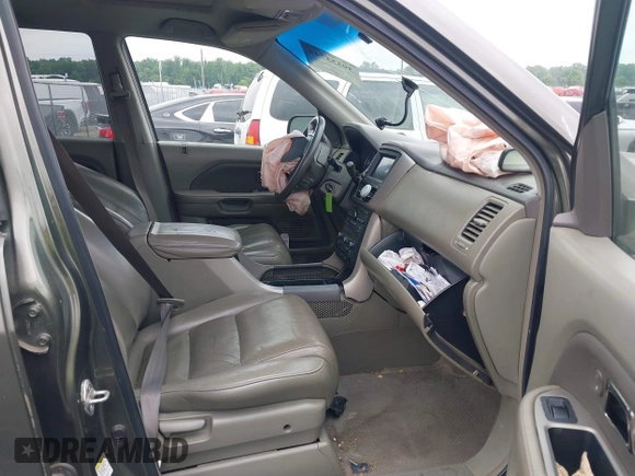 2006 Honda Pilot EX-L with VIN 5FNYF18776B011211, listed as a IAAI auction lot 39555749 with 295,998 mi miles and . Bid and sale history available at DreamBid. Image 5.