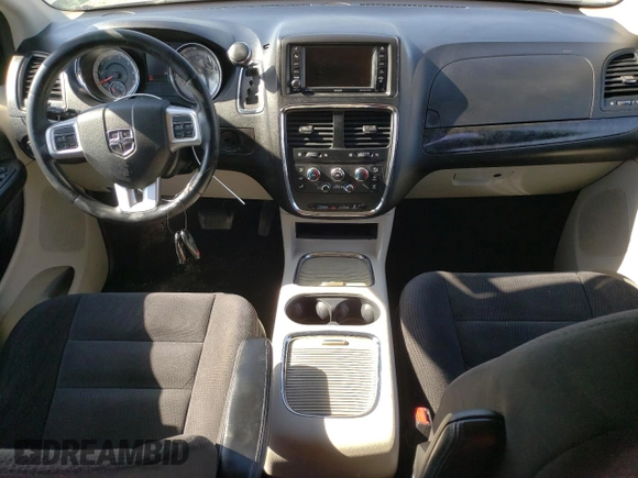 2014 Dodge Grand Caravan SXT z VIN 2C4RDGCG6ER427418, wystawiony jako Copart lot #58804395 z przebiegiem 154 524 mil mil oraz Tytuł czysty. Historia ofert i sprzedaży dostępna na DreamBid. Obrazek 8.