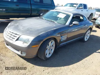 2004 Chrysler Crossfire z VIN 1C3AN69L14X007112, wystawiony jako IAAI lot #40656585 z przebiegiem 99 674 mil mil oraz . Historia ofert i sprzedaży dostępna na DreamBid. Obrazek 2.