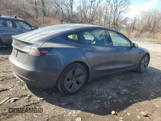 2022 Tesla Model 3 Long Range with VIN 5YJ3E1EB7NF257549, listed as a Copart auction lot 46980555 with 68,955 mi miles and Salvage Title. Bid and sale history available at DreamBid. Image 3.