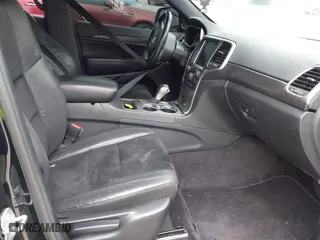 2018 Jeep Grand Cherokee Laredo E with VIN 1C4RJFAG7JC312948, listed as a IAAI auction lot 41624027 with 116,763 mi miles. Bid and sale history available at carsss.com. Image 5.