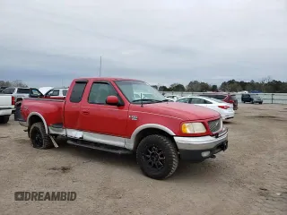 1999 Ford F-150 XL z VIN 2FTRX08L3XCA33434, wystawiony jako Copart lot #88088465 z przebiegiem 252 373 mil mil oraz Szkoda całkowita • Salvage title. Historia ofert i sprzedaży dostępna na DreamBid. Obrazek 11.