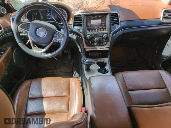 2015 Jeep Grand Cherokee Summit with VIN 1C4RJFJM6FC833687, listed as a Copart auction lot 59620695 with 110,074 mi miles and Salvage title. Bid and sale history available at DreamBid. Image 8.