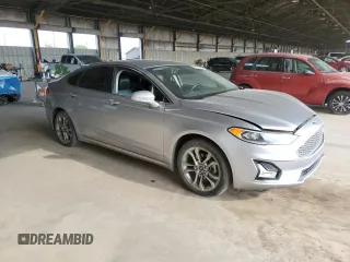 2020 Ford Fusion Titanium with VIN 3FA6P0RU5LR141507, listed as a Copart auction lot 64798205 with 113,216 mi miles and Salvage title. Bid and sale history available at DreamBid. Image 4.