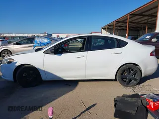 2015 Dodge Dart SXT with VIN 1C3CDFBB0FD165300, listed as a IAAI auction lot 41389305 with 102,884 mi miles. Bid and sale history available at carsss.com. Image 14.