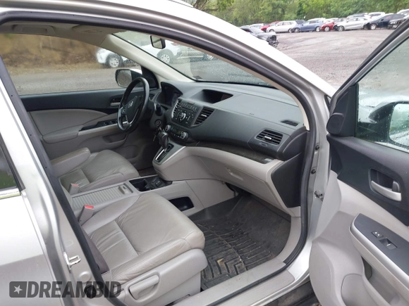 2013 Honda CR-V EX-L with VIN 2HKRM4H73DH618328, listed as a IAAI auction lot 42647497 with 200,667 mi miles and . Bid and sale history available at DreamBid. Image 5.