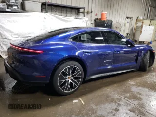 2021 Porsche Taycan z VIN WP0AA2Y13MSA14773, wystawiony jako Copart lot #69774042 z przebiegiem 15 465 mil mil oraz . Historia ofert i sprzedaży dostępna na DreamBid. Obrazek 3.
