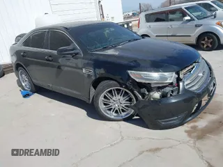 2014 Ford Taurus SEL with VIN 1FAHP2E83EG184976, listed as a IAAI auction lot 41590153 with 177,342 mi miles. Bid and sale history available at carsss.com. Image 1.