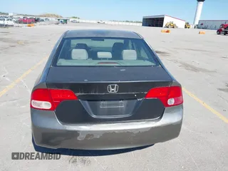 2007 Honda Civic EX with VIN 1HGFA16897L057396, listed as a IAAI auction lot 42175378 with 166,360 mi miles and . Bid and sale history available at DreamBid. Image 12.