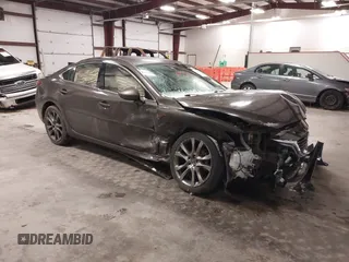 2016 Mazda Mazda6 i Grand Touring with VIN JM1GJ1W56G1430205, listed as a IAAI auction lot 41344256 with 106,777 mi miles. Bid and sale history available at carsss.com. Image 1.