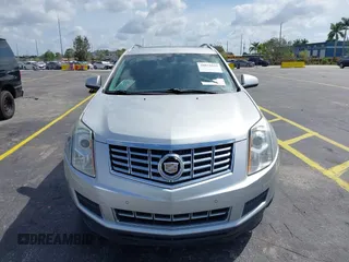 2013 Cadillac SRX Luxury Collection with VIN 3GYFNCE39DS512235, listed as a IAAI auction lot 38873243 with 133,378 mi miles and . Bid and sale history available at DreamBid. Image 6.