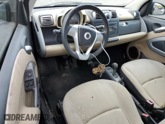 2009 Smart fortwo Pure with VIN WMEEJ31X89K251402, listed as a Copart auction lot 56791545 with 52,636 mi miles and Clean title. Bid and sale history available at DreamBid. Image 8.