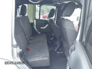 2016 Jeep Wrangler Unlimited Sahara with VIN 1C4BJWEG3GL240859, listed as a IAAI auction lot 42628937 with 103,378 mi miles and . Bid and sale history available at DreamBid. Image 8.