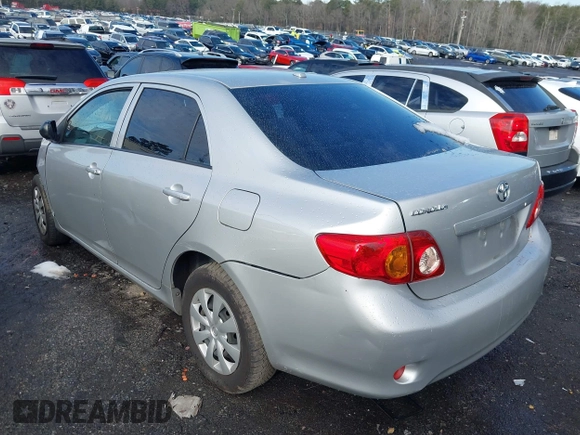 2009 Toyota Corolla with VIN JTDBL40E899083155, listed as a IAAI auction lot 41056942 with 294,132 mi miles. Bid and sale history available at carsss.com. Image 3.