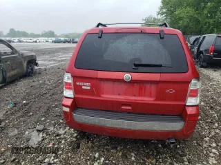 2010 Mercury Mariner Premier z VIN 4M2CN8H75AKJ13425, wystawiony jako Copart lot #57613855 z przebiegiem 90 437 mil mil oraz Szkoda całkowita • Salvage title. Historia ofert i sprzedaży dostępna na DreamBid. Obrazek 6.