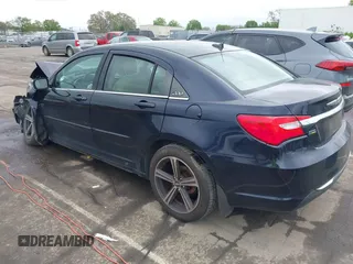 2012 Chrysler 200 LX with VIN 1C3CCBAG2CN228525, listed as a IAAI auction lot 41903611 with 210,201 mi miles and . Bid and sale history available at DreamBid. Image 3.