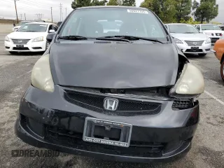 2007 Honda Fit z VIN JHMGD38457S012962, wystawiony jako Copart lot #55927755 z przebiegiem 172 153 mil mil oraz Szkoda całkowita • Salvage title. Historia ofert i sprzedaży dostępna na DreamBid. Obrazek 5.