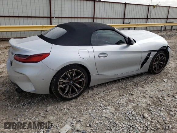 2022 BMW Z4 sDriveM40i with VIN WBAHF9C08NWX40835, listed as a Copart auction lot 68417882 with 9,165 mi miles and . Bid and sale history available at DreamBid. Image 3.