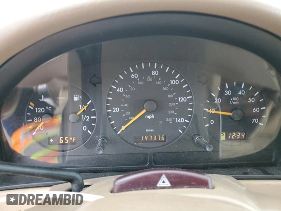 2002 Mercedes-Benz M-Class with VIN 4JGAB54E32A363452, listed as a Copart auction lot 81743994 with 147,376 mi miles and Salvage Title. Bid and sale history available at carsss.com. Image 9.