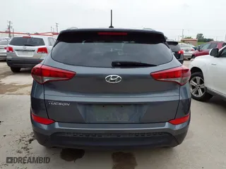 2016 Hyundai Tucson SE with VIN KM8J33A47GU128524, listed as a IAAI auction lot 42078880 with 147,227 mi miles. Bid and sale history available at carsss.com. Image 16.