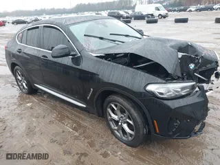 2023 BMW X4 xDrive30i with VIN 5UX33DT05P9R43464, listed as a IAAI auction lot 41507571 with 32,914 mi miles. Bid and sale history available at carsss.com. Image 1.
