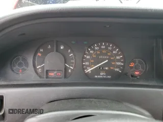 1990 Toyota Corolla z VIN 1NXAE94A6LZ127972, wystawiony jako Copart lot #80673204 z przebiegiem 186 993 mil mil oraz Szkoda całkowita • Salvage title. Historia ofert i sprzedaży dostępna na DreamBid. Obrazek 9.