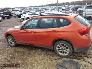 2015 BMW X1 xDrive28i with VIN WBAVL1C50FVY41206, listed as a IAAI auction lot 41508136 with 102,725 mi miles. Bid and sale history available at carsss.com. Image 14.